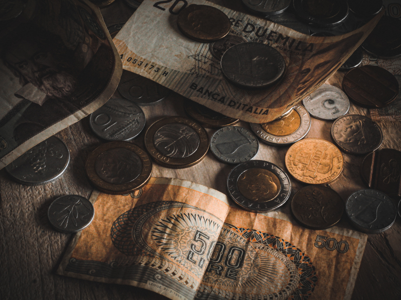 Photo by Franco: https://www.pexels.com/photo/banknotes-and-coins-on-table-15522683/