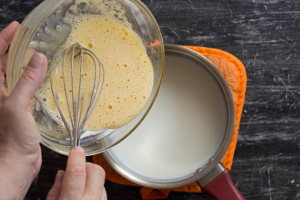 Adding milk or cream to your scrambled eggs