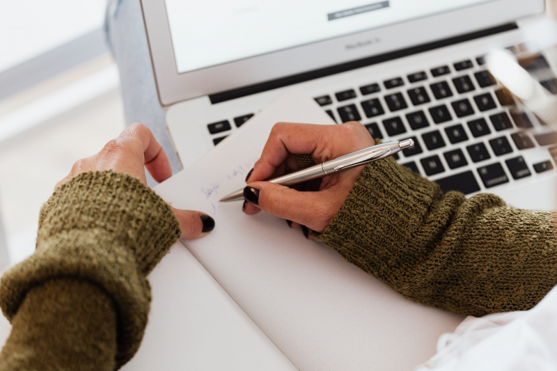 Photo by Karolina Grabowska on Pexels ( https://www.pexels.com/photo/crop-woman-taking-notes-while-working-on-laptop-4468010/)