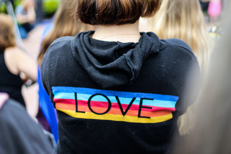 Photo by Rosemary Ketchum: https://www.pexels.com/photo/woman-in-black-and-multicolored-love-print-hoodie-2306823/
