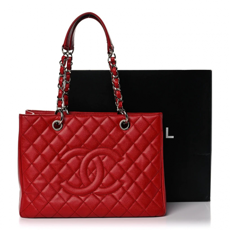Screenshot of https://carolinesfashionluxuries.com/products/chanel-caviar-quilted-grand-shopping-tote-gst-red