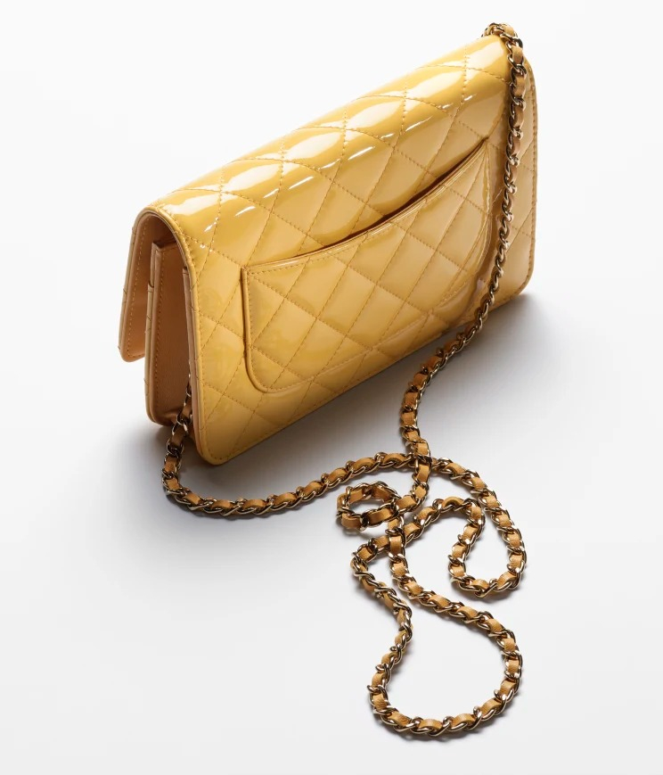 Screenshot of https://www.chanel.com/us/fashion/p/AP0250B02244NO201/classic-wallet-on-chain-patent-calfskin-gold-tone-metal/