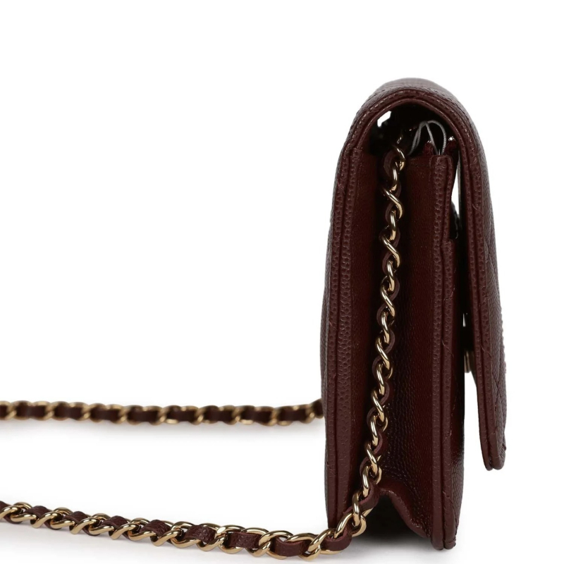 Screenshot of https://madisonavenuecouture.com/products/chanel-wallet-on-chain-woc-burgundy-caviar-light-gold-hardware?variant=40016231006302