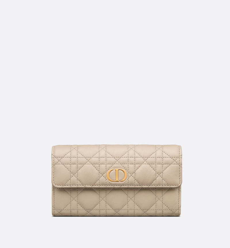 Screenshot of https://www.dior.com/en_vn/fashion/products/S5134UWHC_M116-dior-caro-pouch-sand-colored-supple-cannage-calfskin