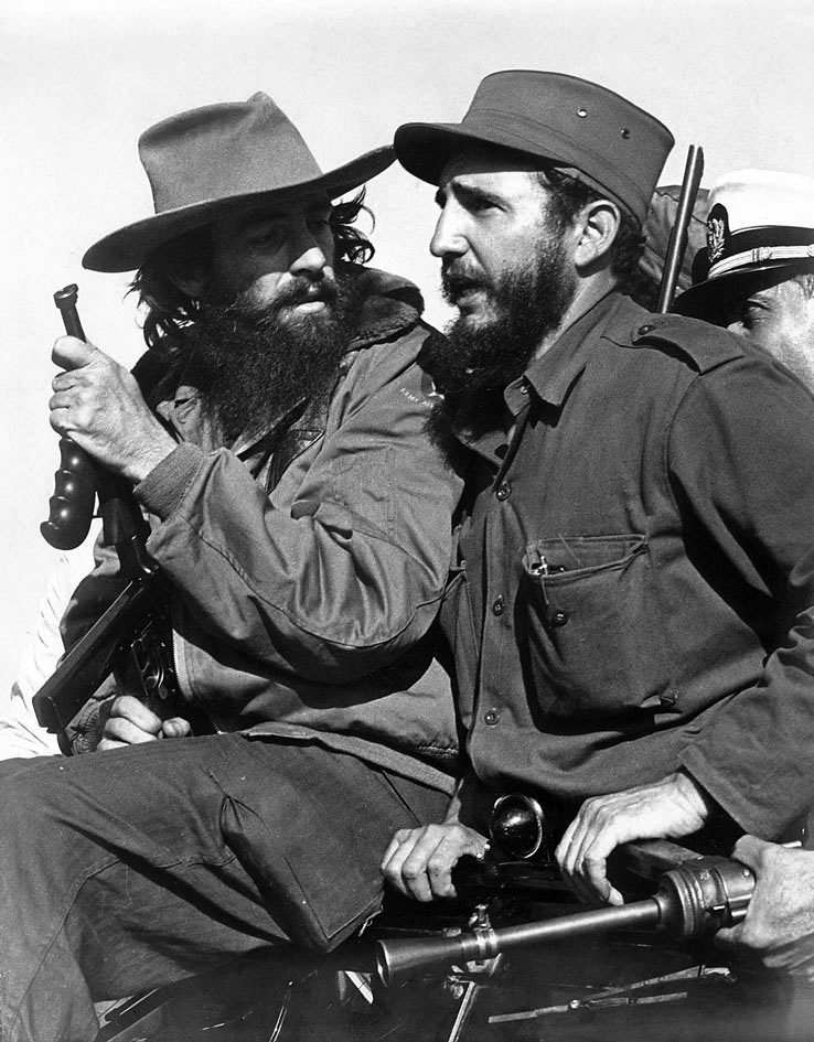 Cienfuegos, left, with Fidel Castro -en.wikipedia.org