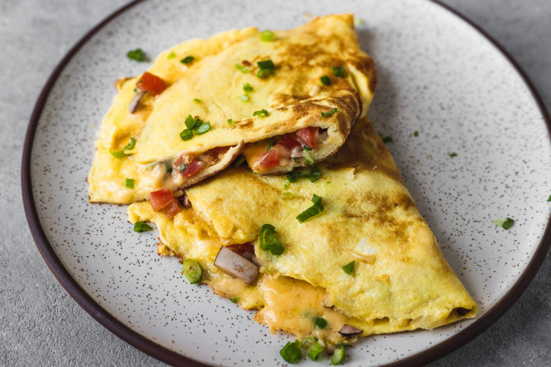 Cook a veggie omelet
