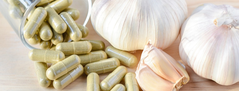 Eat garlic or take garlic extract supplements