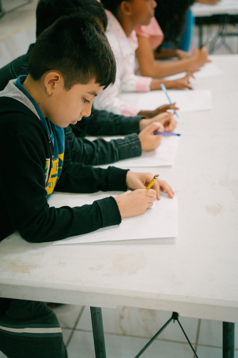 Photo by Kairos Panamá: https://www.pexels.com/photo/kids-learning-at-school-19487327/