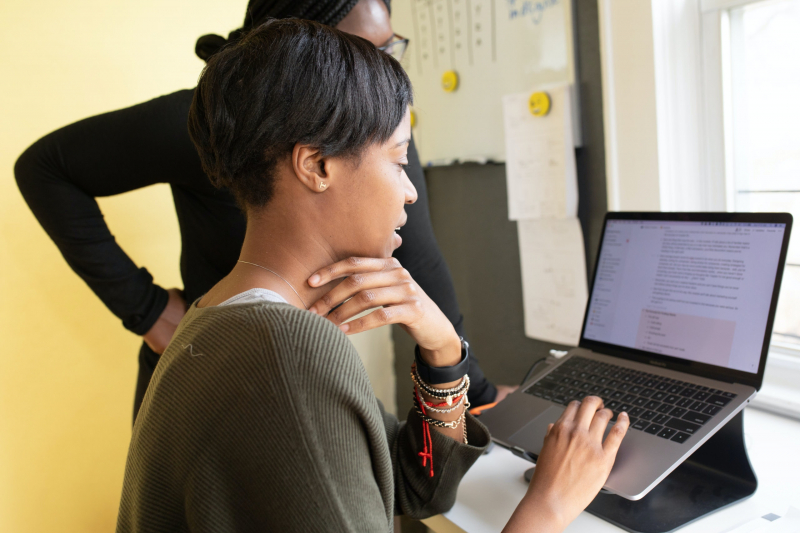 Photo by nappy on Pexels (pexels.com/photo/woman-in-a-grey-sweater-working-on-a-laptop-3514797/)