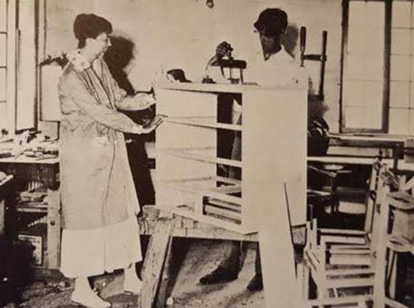 Photo: Eleanor Roosevelt with a Val-Kill Industries worker in the factory.