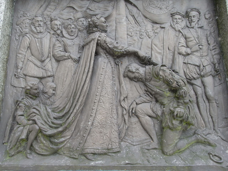 Photo:  Wikimedia Commons - Bronze relief of Sir Francis Drake being knighted by Queen Elizabeth I