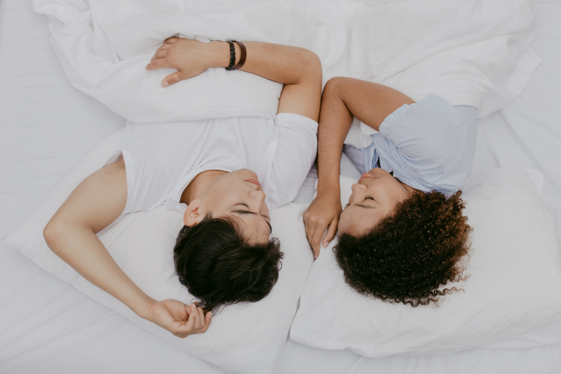 Photo by cottonbro studio: https://www.pexels.com/photo/a-couple-sleeping-on-bed-6616011/
