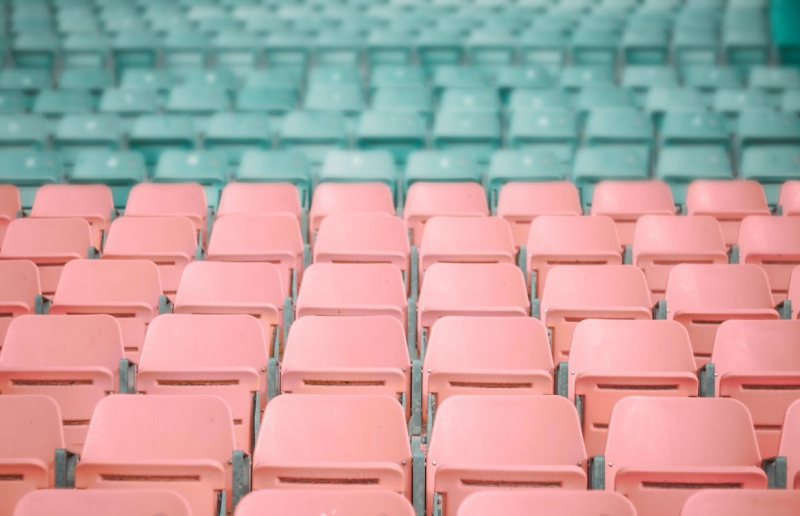 Photo on Pexels: https://www.pexels.com/photo/pink-and-blue-stadium-chairs-752036/