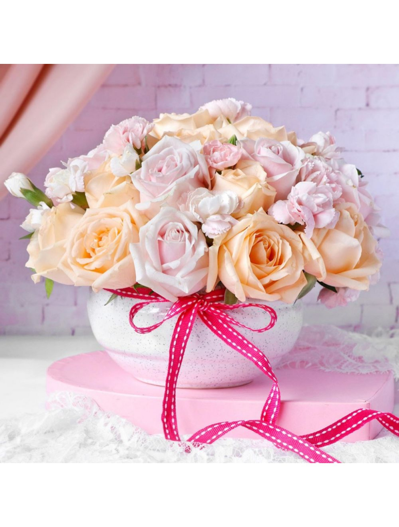 Photo: https://fleurop.com/en/roses-carnations-in-ceramic-bowl-to-india-hd1139339