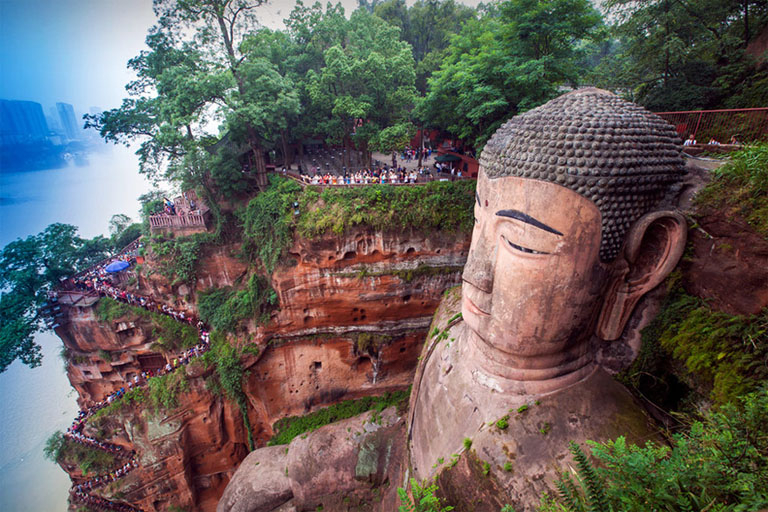 The plank road that leads up and down Leshan Giant Buddha.- China Discovery