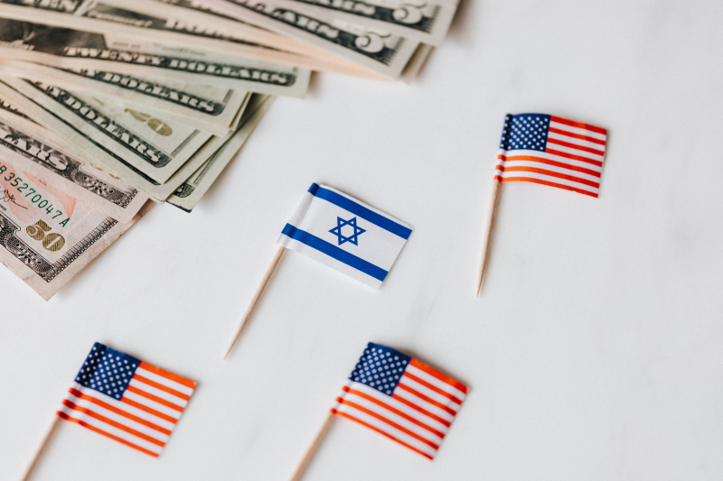 Photo by Karolina Grabowska: https://www.pexels.com/photo/flags-of-usa-and-israel-placed-near-dollar-banknotes-4386440/