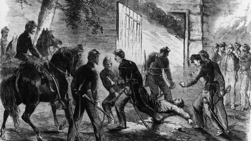 Photo:  Getty Images - John Wilkes Booth being dragged from the barn on Garrett's farm by Union cavalry sent to capture him after his assassination of President Lincoln.