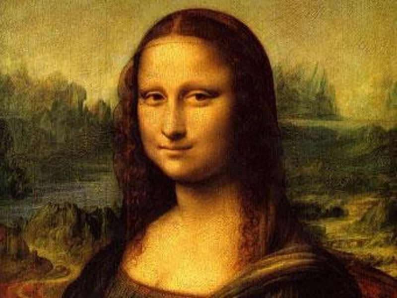 The most famous piece that you can find at Le Louvre is the knowing smile of the Mona Lisa by Leonardo da Vinci. Photo: Wikipedia