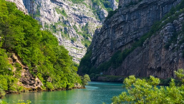 The Sarajevo-Mostar route takes you through canyons carved by the emerald Neretva river- DanitaDelimont.com/Adobe Stock