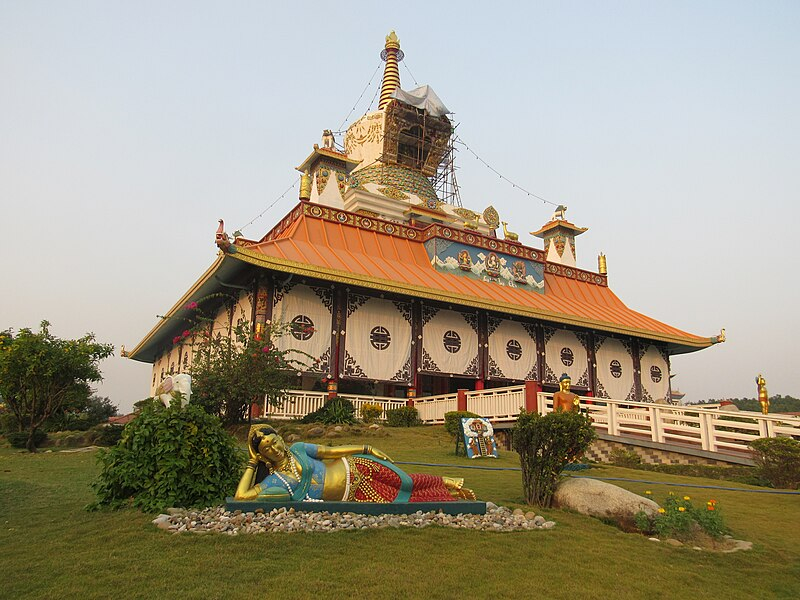 Photo by https://commons.wikimedia.org/wiki/File:Buddhist_Temple_in_Lumbini.jpg