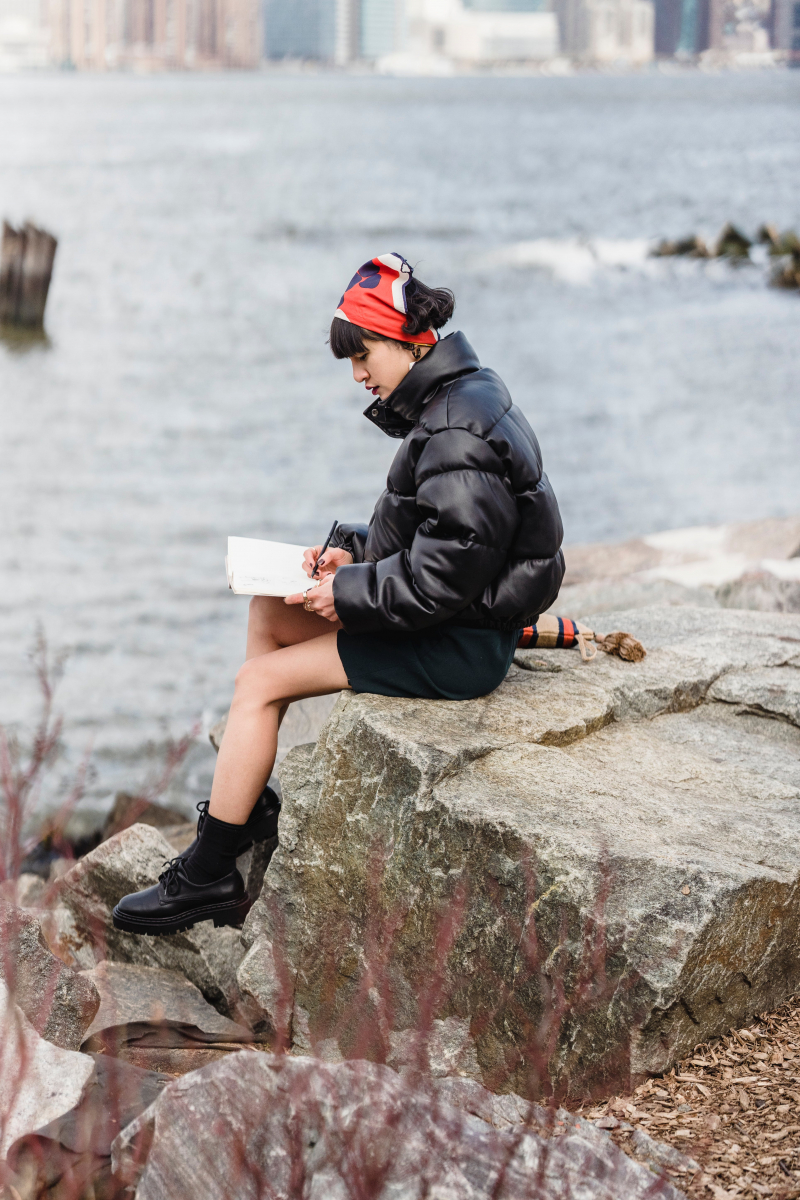 Photo by Michael Burrows: https://www.pexels.com/photo/young-concentrated-woman-drawing-sketches-in-notebook-on-river-bank-7148030/