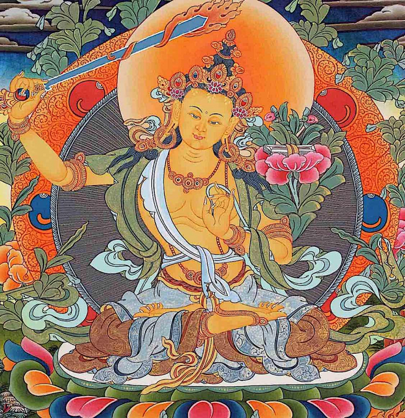 Orange Manjushri with his sword of wisdom that “cuts through delusions.” - buddhaweekly.com