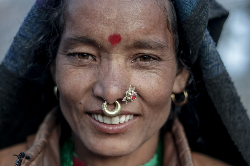 An Indian woman with nose piercings on the left to mark her maritual status. Photo on Wikimedia Commons