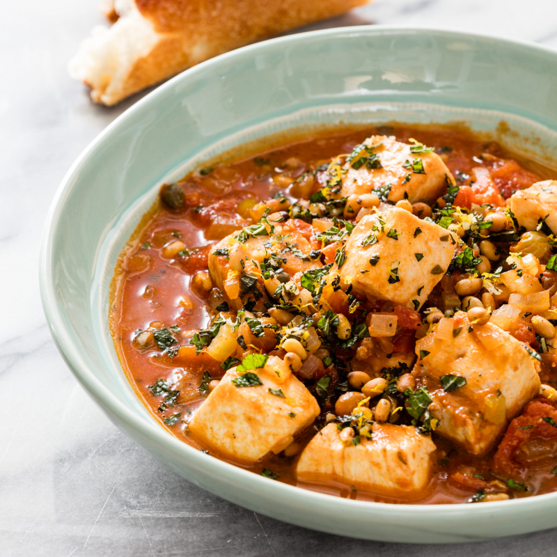 One of many tasty recipes inside: Sicilian Fish Stew (Via:  America's Test Kitchen)