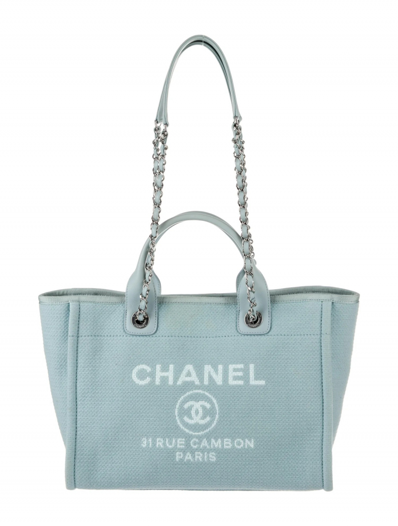 Screenshot of https://www.therealreal.com/products/women/handbags/totes/chanel-2022-small-deauville-tote-w-pouch-imgbx
