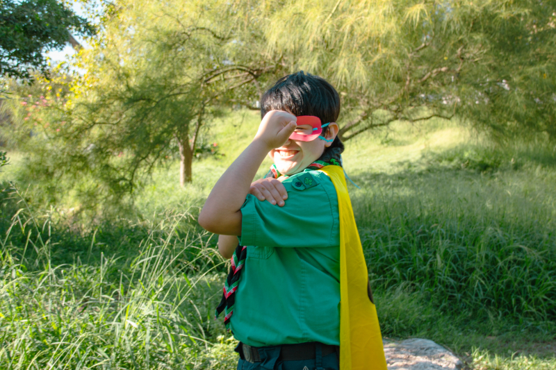 Photo by Andrea Sánchez on Unsplash: https://unsplash.com/photos/a-boy-in-a-green-shirt-and-yellow-scarf-6B9zyqrOOMc