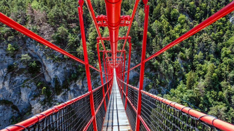 Niouc suspension bridge - YouTube
