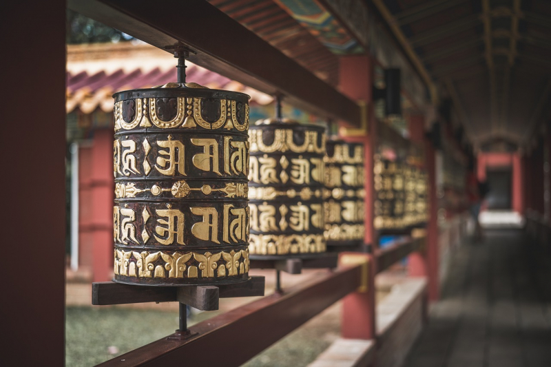 Photo on Pixabay (https://pixabay.com/photos/temple-prayer-wheel-buddhism-5619197/)