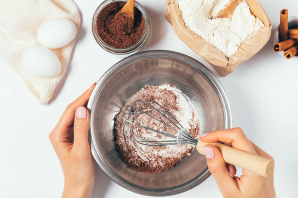 Not using cocoa powder to flour your pans
