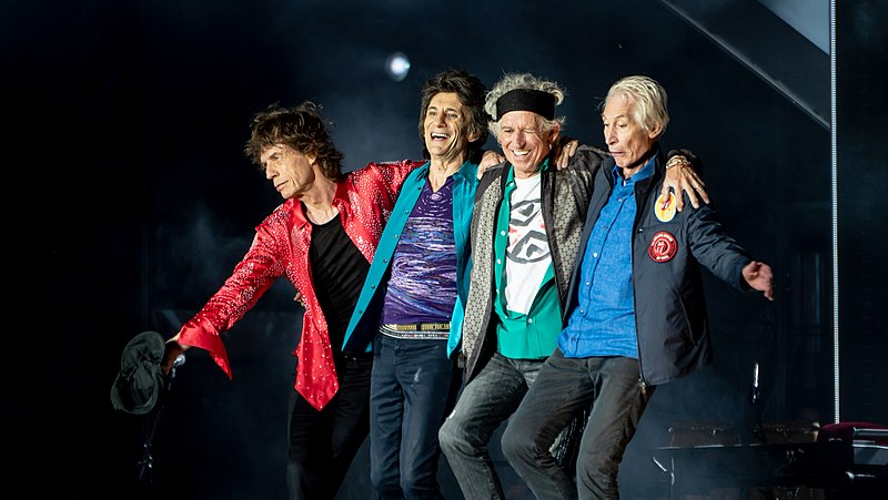 Photo on Wikimedia Commons https://commons.wikimedia.org/wiki/File:Rolling_Stones_bow_post-show_22_May_2018_in_London_%2841437870275%29.jpg