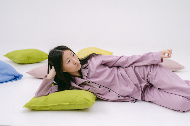 Photo by SHVETS production: https://www.pexels.com/photo/woman-in-purple-sleepwear-lying-down-on-floor-8416221/