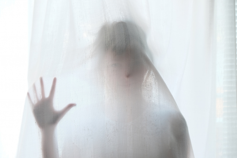 Photo by Steinar Engeland on Unsplash: https://unsplash.com/photos/woman-holding-behind-curtain-SNiOntJ62ws