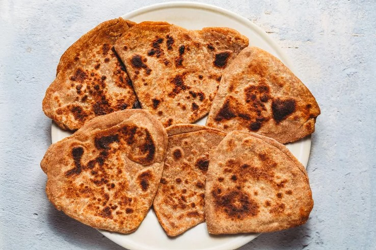 Screenshot via https://www.thespruceeats.com/how-to-make-parathas-pan-fried-indian-flatbread-4122134