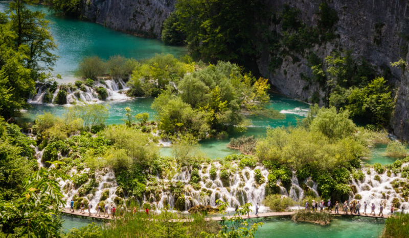 Photo: https://minoritynomad.com/plitvice-lakes-national-park-best-park-central-europe/