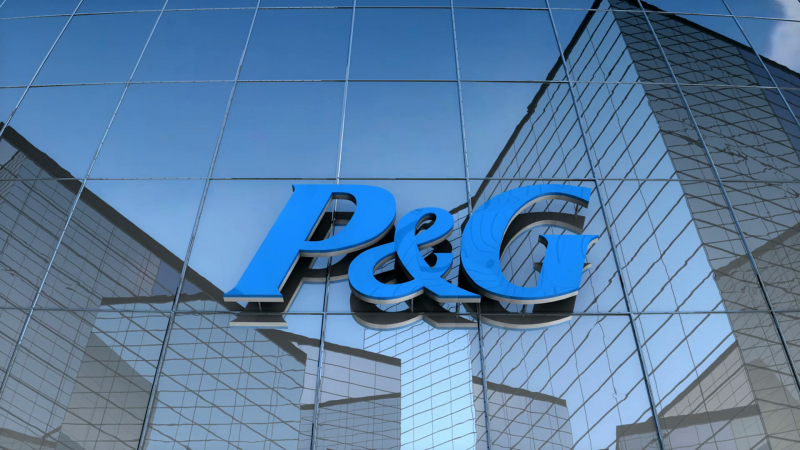 P&G logo on glass building. Photo: dm0qx8t0i9gc9.cloudfront.net