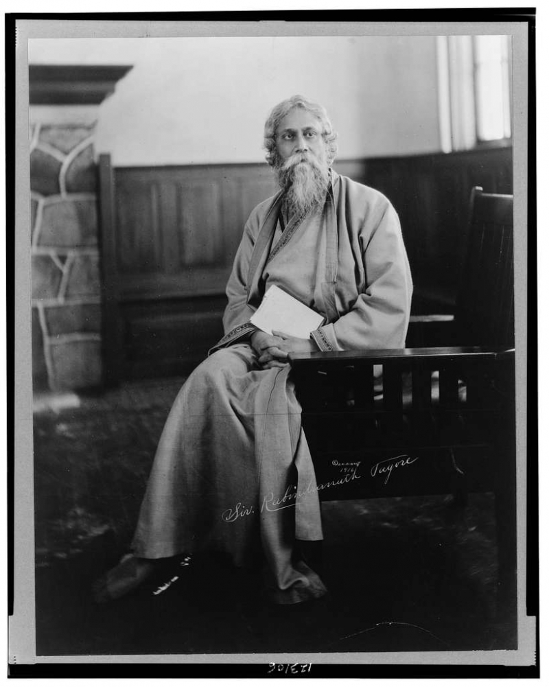 Photo on  LOC's Public Domain A (https://loc.getarchive.net/media/rabindranath-tagore-full-length-portrait-seated-facing-front)