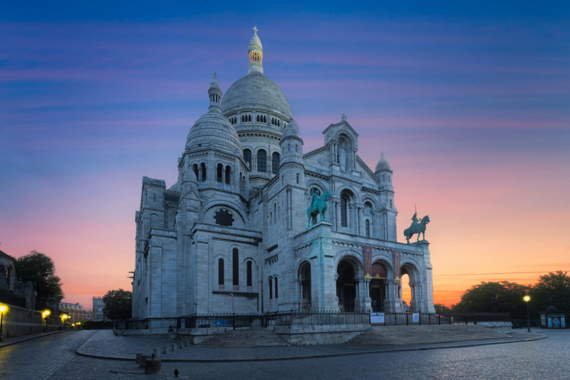 The Basilica of Sacré-Cœur is located atop the Montmartre butte, the highest point in the city- Source: lonelyplanet