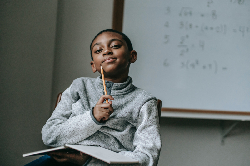 Photo by Katerina Holmes: https://www.pexels.com/photo/thoughtful-black-boy-with-pencil-5905861/