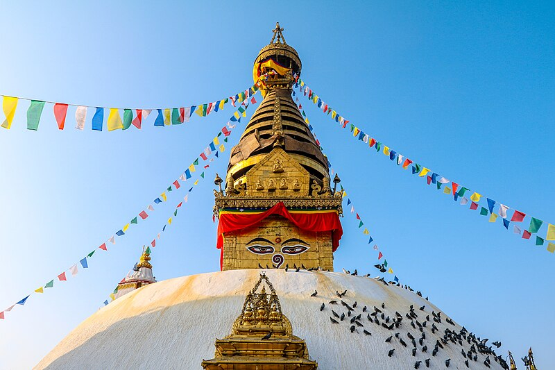 Photo by https://commons.wikimedia.org/wiki/File:Swayambhunath_temple_-_an_ancient_religious_architecture_of_Nepal.jpg