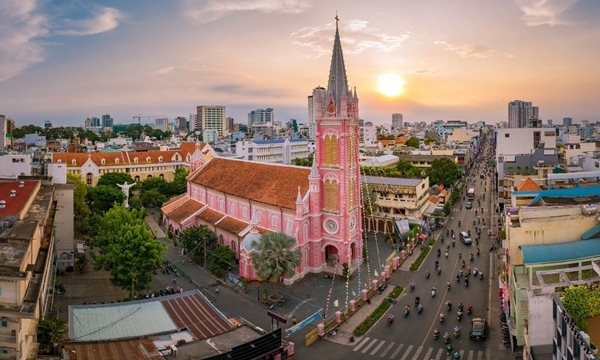Tan Dinh Church is a pink Disney castle Gothic church that stands out on a busy street in Ho Chi Minh City - Source: Exotic Travel