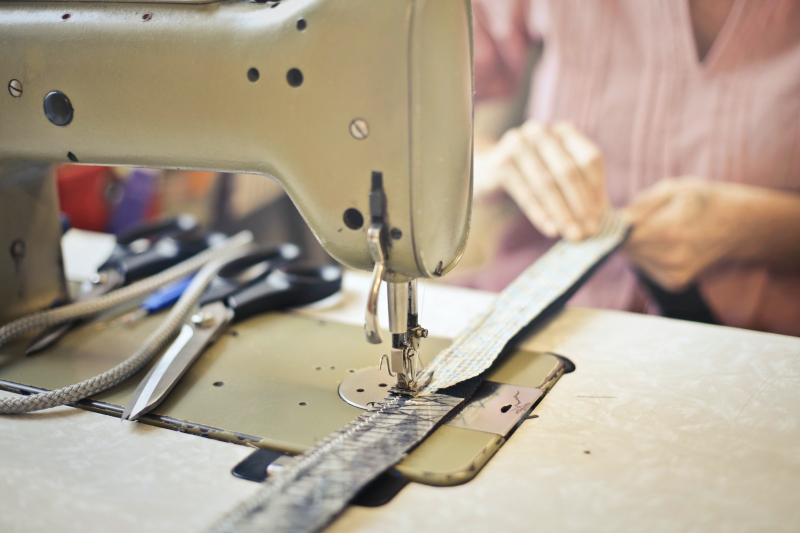 Photo by Andrea Piacquadio on Pexels (https://www.pexels.com/photo/seamstress-stitching-clothing-item-on-sewing-machine-3771080/)