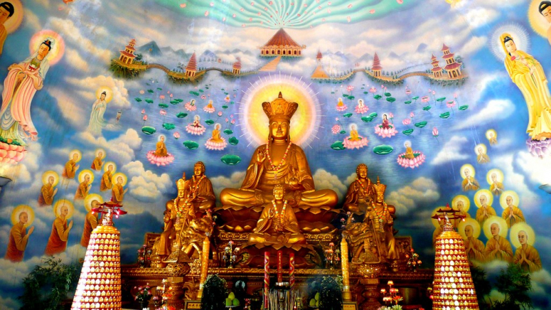 Buddhist temple art including a central statue of Ksitigarbha Bodhisattva, and his Pure Land including attendant bodhisattvas, and arhats who are paying their respects. Saigon, Vietnam. - Photo on Wikimedia Commons (https://commons.wikimedia.org/wiki/File:Ksitigarbha_Statue_Mural_Vietnam.jpeg)