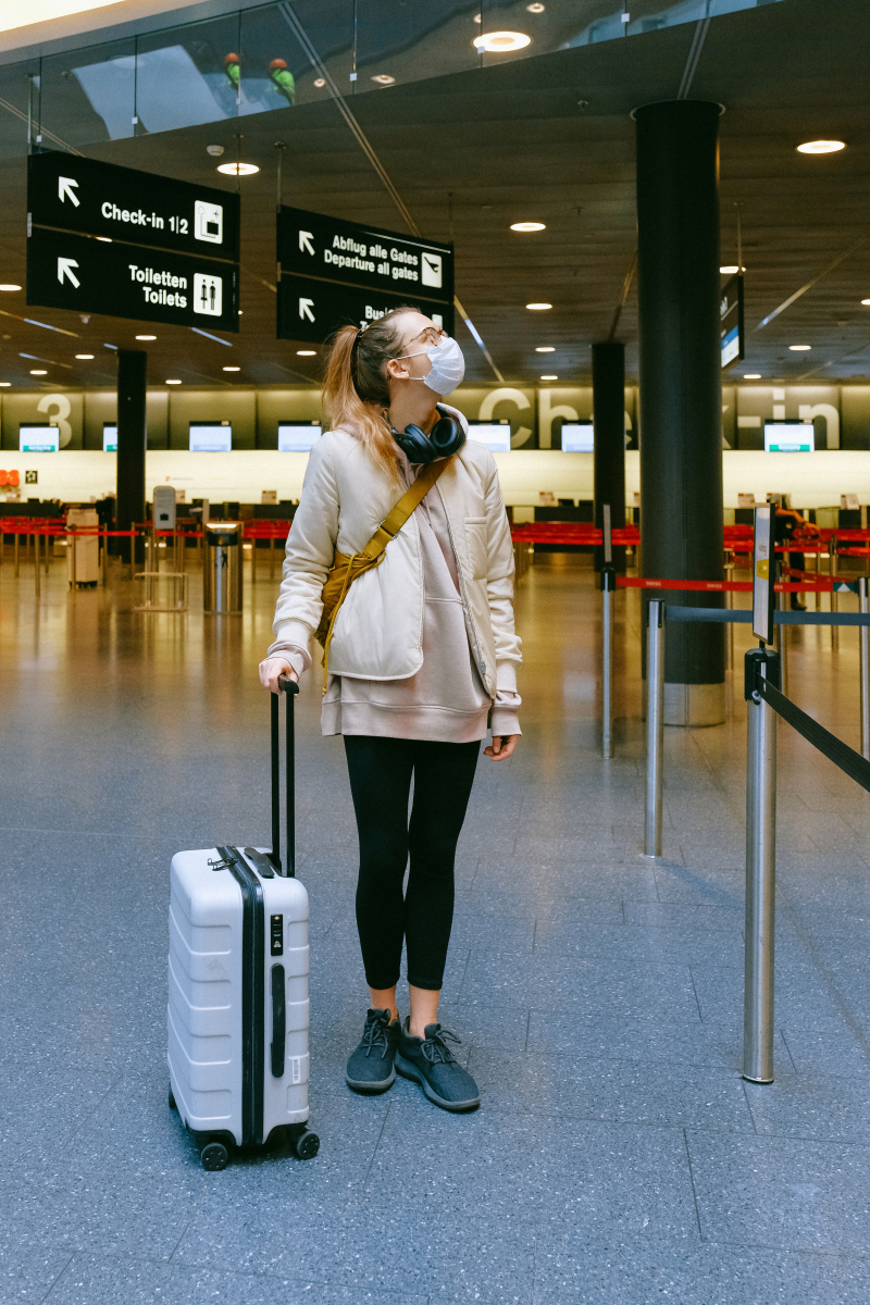 Photo by Anna Shvets: https://www.pexels.com/photo/woman-wearing-face-mask-at-airport-3943883/