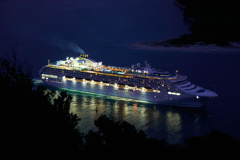Photo on Wallpaper Flare: https://www.wallpaperflare.com/white-cruise-ship-on-ocean-trees-water-night-nautical-vessel-wallpaper-zcsjx