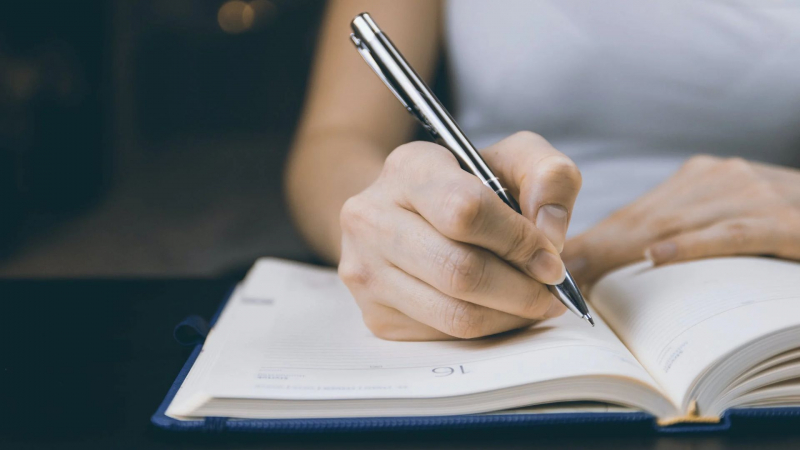 Photo by JESHOOTS.com on Pexels https://www.pexels.com/photo/photo-of-person-writing-on-notebook-834897/